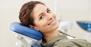 Relaxed female patient attending appointment for occlusal adjustment